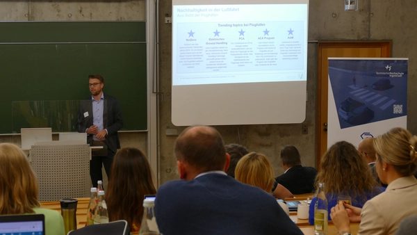 Photo of the participants of the networking event in a lecture theatre at THI