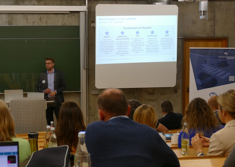 Photo of the participants of the networking event in a lecture theatre at THI