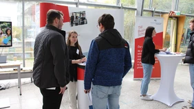 The study ambassadors in conversation with prospective students.