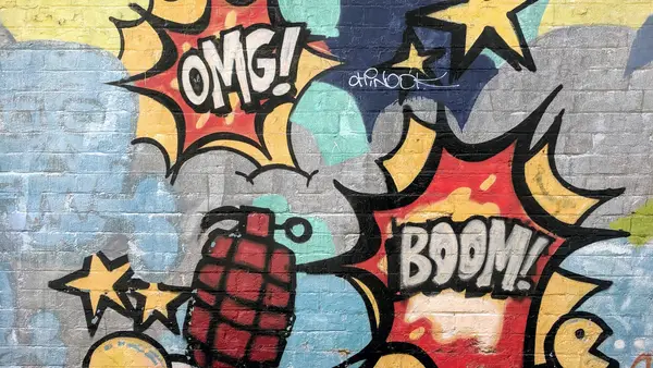 Wand mit Graffiti - OMG - BOOM